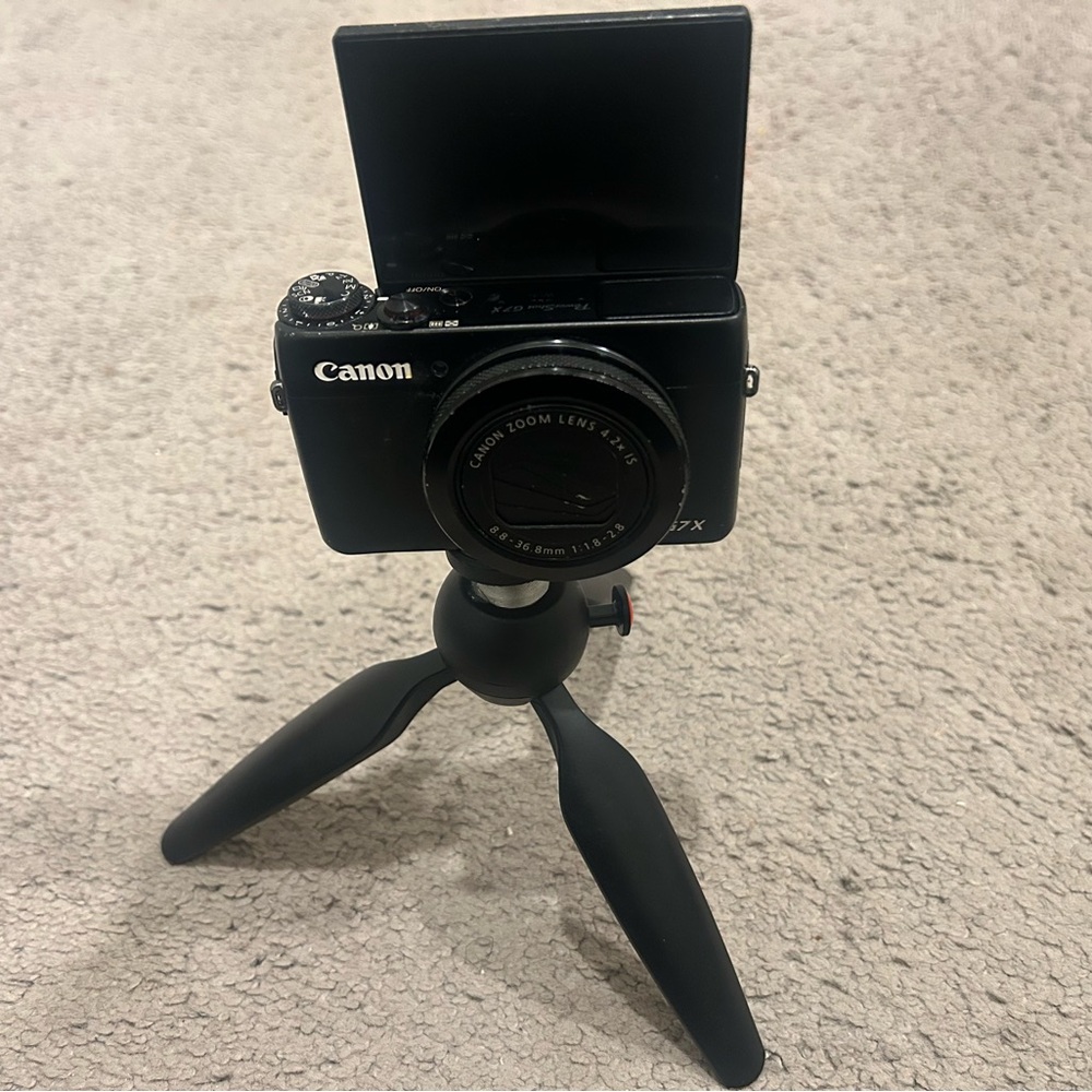 Canon Black Digital Camera with Flip-Up Screen used but working beautifully.